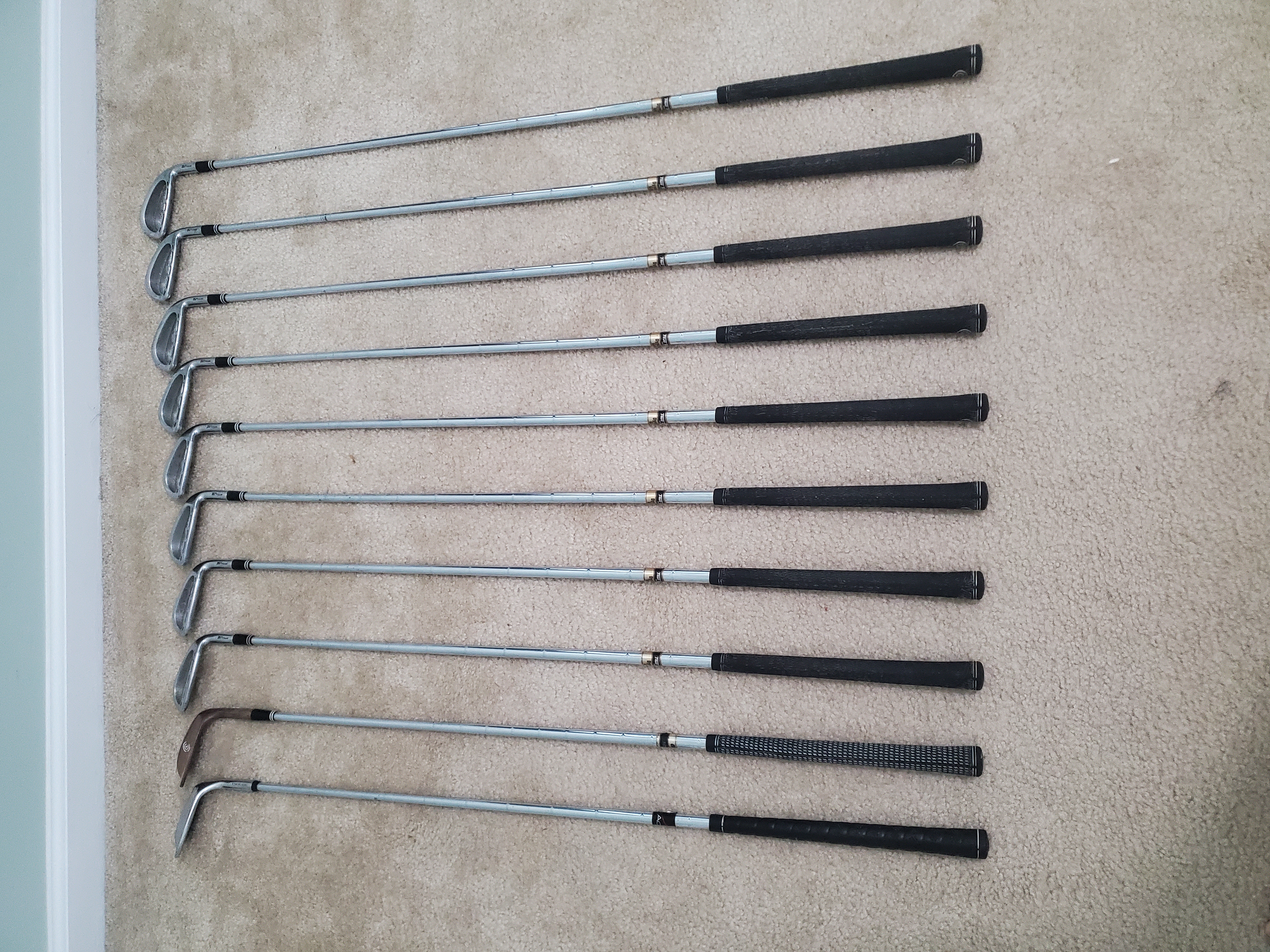 Worn golf grips before regripping
